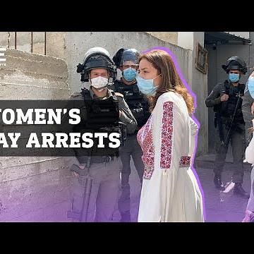Israeli soldiers arrest Palestinian women during International Women's Day event