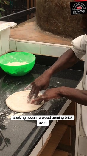 how to cook pizza in a wood burning brick oven