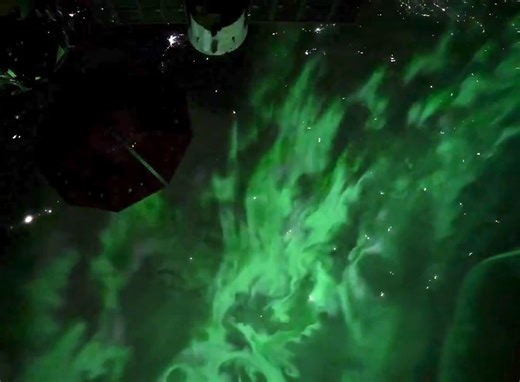 Vivid Green Earth Aurora | International Space Station FriendsofNASA.org: NASA astronaut and Expedition 72 flight engineer Don Pettit has released this short timelapse video of aurora over Earth. Auroras are produced when the Earth's magnetosphere is sufficiently disturbed by the solar wind that the trajectories of charged particles in solar wind and magnetospheric plasma, mainly in the form of electrons and protons, precipitate them into the upper atmosphere (thermosphere/exosphere) due to Eart