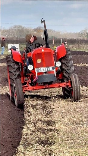 Nuffield 460 tractor with a 3 furrow plough