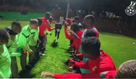 Benjamin Asare, Yirenkyi, and Thomas-Asante receive a guard of honour at Black Stars camp