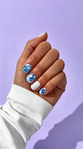 21K views · 208 reactions | When your nails are a literal masterpiece  Our new collection “Artist Studio” drops tomorrow, and “Floral Impressions” is just a sneak peak of the dreamy watercolor, soft brushstrokes, and shimmering glitter vibes of this drop. Who’s ready to add this mani to their lineup? ✨ https://bit.ly/4huhmjq #ColorStreet #BlueNails #WhiteNails #NaturalNailArt #ShortNailDesigns #NailInspo #MarchNails | Color Street | Facebook