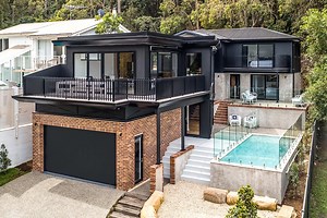 SLOPING BLOCK HOUSE DESIGN SPECIALISTS