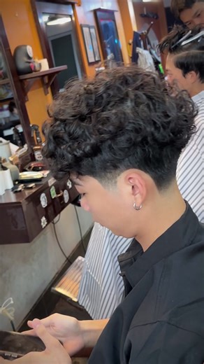 Curly Hair with Taper Fade: Stylish Men's Haircuts