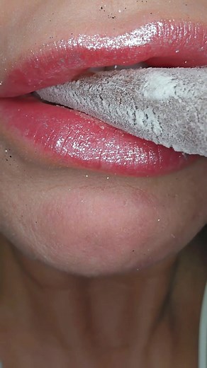 Glossy Lips and Nail Art: A Close-Up Experience