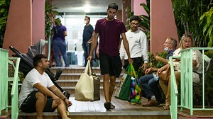 Miami building officials explain to residents why they must evacuate Flagami building