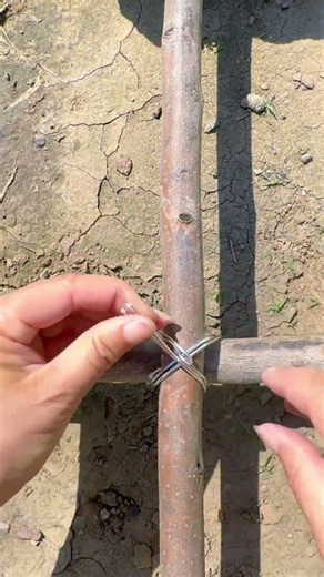 Wire Lashing Trick Ties Crossed Sticks Together Using Nail Twist Tool