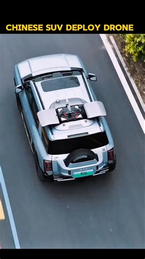 real guys on Instagram: "Chinese SUV Deploys Onboard Drone While Driving – Futuristic Car Tech! Witness the next level of automotive innovation in China! This sleek electric SUV features a built-in drone that launches seamlessly from the roof while the vehicle is in motion. The roof panel opens automatically, the compact drone takes off, and captures stunning aerial views – perfect for adventure seekers or advanced navigation. A glimpse into how Chinese car manufacturers are integrating cutting-