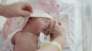 Newborn Baby Being Dressed By Her Stock Footage Video (100% Royalty-free) 1060754629 | Shutterstock