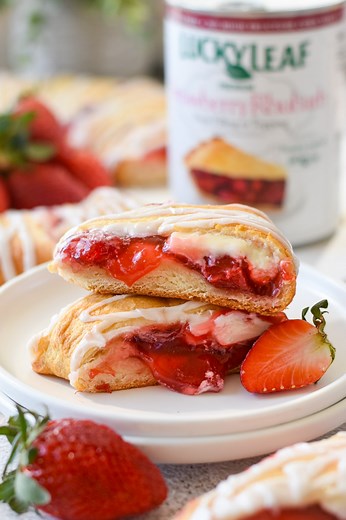 Make THIS for your Easter brunch! Thanks to Lucky Leaf, this Strawberry Rhubarb Crescent Ring is SO much easier than it looks & will be the perfect centerpiece for your Easter brunch! Visit https://www.luckyleaf.com/recipe/strawberry-rhubarb-crescent-ring/ to get the full recipe and to learn more about the heart of lucky leaf …their family farms. #Sponsored #LuckyLeaf #FruitFilling #EasyEasterRecipe #EasterBrunch #RecipeReels #FoodBlogger #BrunchIdeas | Dance Around the Kitchen