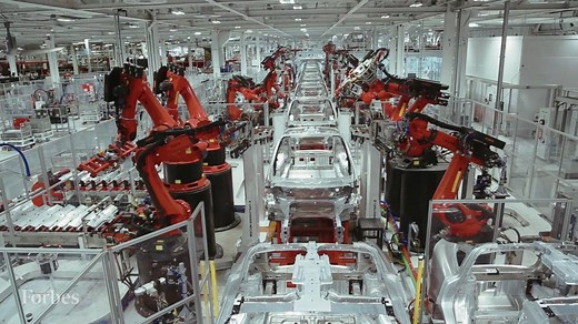 Tesla's factory in Fremont, California has the capacity to build 500,000 vehicles. The question is, can they do it efficiently? Take a look inside. | Forbes