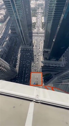 She Jumps 135ft in Dubai — No Rope 😳 #shorts #viral #trending #cliffjumping