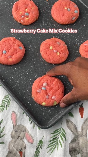 When strawberry cake mix cookies meet spring chips 😍😍You’ll need… 1 box Pillsbury™ Moist Supreme® Strawberry Cake Mix 1/2 cup oil 2 eggs Colored chocolate chips Step 1: Preheat oven to 350F. Combine cake mix, eggs, and oil in a bowl until well blended. Stir in colored chocolate chips Step 2: Scoop rounded tablespoonfuls of dough onto cookie sheets. Step 3: Bake for 10 minutes or until the outside looks dry but not browned (the inside will be soft). Optional: while the cookie is still warm, use
