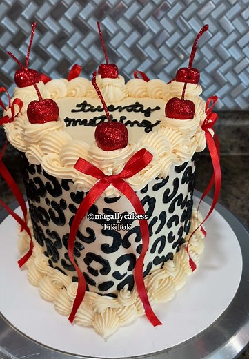Let’s decorate this animal print cake with red details step-by-step. #Cake #Cakes #Buttercream #ButtercreamCake #Birthday #BirthdayCake #HeartCake #Glitter #GlitterCherries #AnimalPrintCake #CheetahPrintCake #LeopardPrintCake #CakeDecorating #CakeDecorator #CakeTutorial #CakeLady #Magally #MagallyCakes