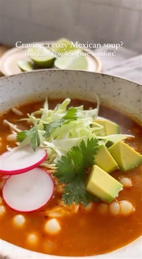 Pozole Soup Recipe Ingredients: - 1 1/2 lbs chicken thighs or breast (or turkey) - 6 cups chicken broth - 2 cups water - 1 onion, quartered - 4 cloves garlic - 2 bay leaves - 1 teaspoon oregano - 1 teaspoon cumin - 1 teaspoon smoked paprika - 2 cans white hominy, drained - 3 dried guajillo or ancho chiles, softened in hot water and blended - Salt and pepper to taste - Garnishes: shredded cabbage, sliced radishes, lime wedges, cilantro, avocado Directions: 1. Place chicken, broth, water, onion, g