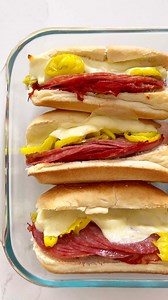This baked Italian Grinder Sandwich recipe is the perfect crowd-pleasing main dish. Packed with capicola hot ham, salami, melty cheese, and banana peppers stuffed in a hoagie roll and dipped in Italian dressing- game day never tasted so good! GET THE RECIPE: https://www.thelifejolie.com/italian-hoagie-recipe/ | The Life Jolie Blog