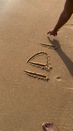 Writing Names in the Sand: A Beach Memory