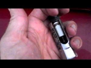 Spark plugs in a tight spot. Here is a tool mod for a great solution.