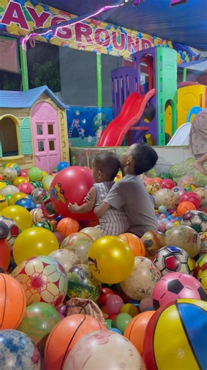 Hugging in the ball pool