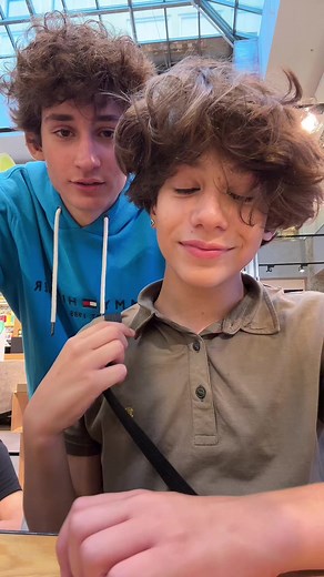 Casual Indoor Fun: Friends Playing and Laughing Together