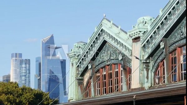 New York City Manhattan Midtown Hudson Yards towers from New Jersey, old historic ferry boat terminal 1907, Hoboken, United States. American highrise skyscraper building and green cooper architecture.