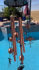 Let the flamingo chimes bring calming, peaceful sounds to your pool or patio. 🦩🌊 | The Popular Flamingo