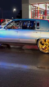 Cadillac on gold 26’s Ruccis slidin