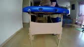 Woman lie on comfortable blue table and professional masseur man...