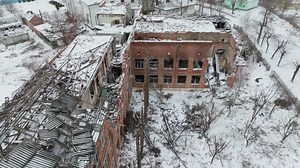 Bomb war winter Ukraine aerial destruction destroy building house