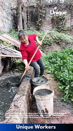 Hilarious Fail: Woman Pulls Old Clothes Out of Drain!