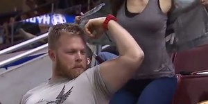 Cocky muscle-man tries to show off in front of the wrong woman