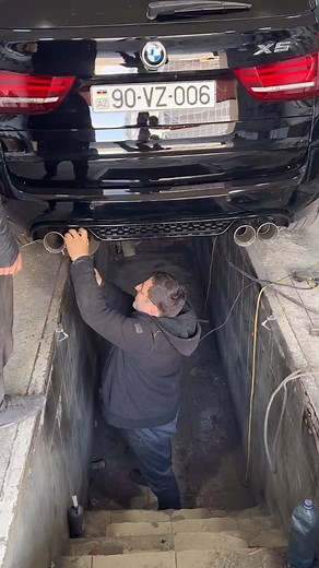 BMW Exhaust System Maintenance in Industrial Workshop