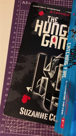 Starting to rebind The Hunger Games Trilogy and TBOSAS!! #rebindingpaperbacks #hungergames #booktok #bookish #trending