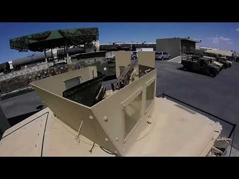 Humvee with mounted .50 cal machine gun