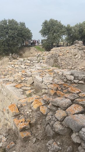 Troy refers both to the remains of a Bronze Age fortress at Hisarlik Hill near the entrance of the Dardanelles and the legendary city of King Priam that was destroyed by Achaeans (Greeks) in the Trojan War. The hill is associated with the sagas of the Trojan War and its description by Homer (750 BC) in his two epic poems “The Iliad” and “The Odyssey.” Archaeological digs have revealed nine cities and various ruins of the city walls, typical house foundations, a temple and a theater. There is als