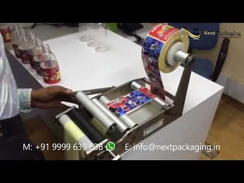 Manual Round bottle sticker labeling machine