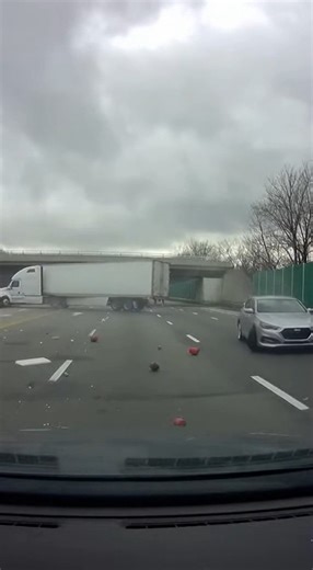 Semi-Truck Jackknifes in Highway Pileup Hauppauge, New York — October 12, 2025 A routine morning commute turned into a scene of destruction on a major interstate Wednesday as a chain-reaction crash resulted in a massive semi-truck jackknifing across several lanes of traffic. The incident, captured on a dashboard camera, shows the terrifying speed at which highway conditions can deteriorate when a single vehicle loses control. The footage begins with a dark SUV suddenly swerving and slamming into