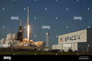The SpaceX Falcon 9 rocket launches at 6:27 PM from historic Complex 39A at the Kennedy Space Center, Florida on March 30, 2017. This is the first time that a "flight-proven" booster is used to launch a payload into space. The vehicle is lifting an 11,000 pound satellite for the Luxembourg based company, SES, to provide video, TV and communications services to Latin America, Mexico and the Caribbean. Photo by Joe Marino-Bill Cantrell/UPI Stock Photo - Alamy