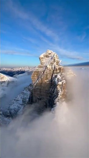 Flying a Stemme Glider High Above Snowy Mountain Peaks
