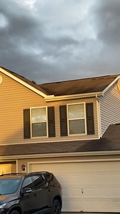 WATCH: Video in Peebles, Ohio shows shingles on a roof flapping up and down as strong winds blast through the area. (Credit: Ashley Nesbitt.) | WLWT