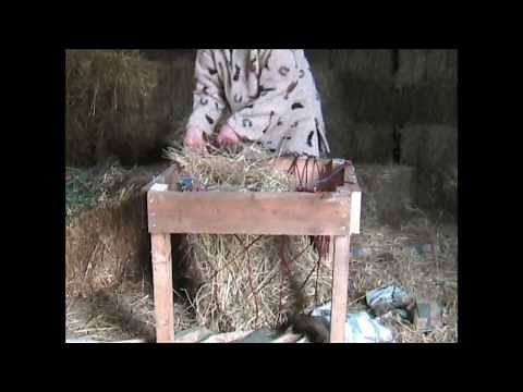 An easy and quick way to fill horse hay nets without tears