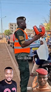 835K views · 10K reactions | Only in Burkina Faso  a police officer giving drivers and riders quick road safety tips at a traffic signal #highlightseveryonefollowers #facebookreels #BurkinaFaso #highlights The Inspiring Podcast | Mc Ebua | Facebook