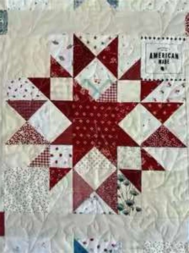 I know the Fourth of July is over, but I had to share my firework Quilt that I made for my red, white and blue fabric stash. Pattern is Star of the Sea by Cake Stand Quilts. #quilts #flagquilt #quilt #sewing #quilting