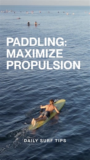 Maximize your propulsion with the proper paddling technique! 🏄💪 · Arch your back; the surfboard nose should be 2cm out of the water. · Center yourself on the board, feet together to reduce drag. · Hand entry: High elbow, hand in front of your shoulder, near the rail. · Catch: Keep your elbow high, arm wrapping around an imaginary log. · Pull: Align your hand and forearm, fingers together for max propulsion. · Recovery: Elbow exits first, leading your hand into the next stroke. Looking for more