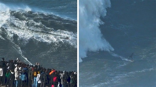 Daredevil surfer rides massive wave off Portuguese coast