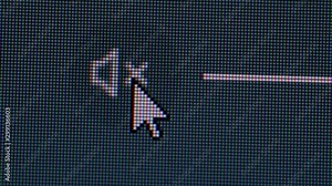 Clicking the volume mute icon in a computer screen monitor, closeup macro showing each individual pixel