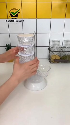 Rotating 5-Tier Kitchen Sugar Salt Pepper Spices Rack Seasoning Storage Box Pot For Condiment Spice Jar Kitchen Accessories💰(Price-799TK) 📦 পণ্য হাতে পেয়েই মূল্য পরিশোধ করুন! ✅ (Cash on Delivery) 🚚 ডেলিভারি চার্জ 🔹 ঢাকার মধ্যে: 60 টাকা 🔹 ঢাকার বাইরে: 130 টাকা ➤Vertical Rotatable Seasoning Box With Transparent Rotating Design Spice Box For Salt Jar Spoon Rotary Storage Rack Kitchen Gadgets Description: This rotatable seasoning container will be your ideal choice if you are looking for the ri