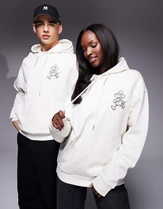 ASOS DESIGN Disney unisex oversized hoodie with Mickey Mouse prints in beige | ASOS