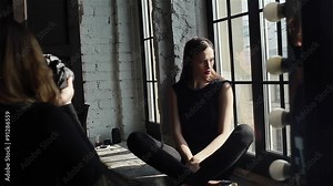 Fashion photo shoot of young attractive female model. Close-up