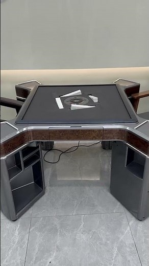 fully automatic mahjong table designed with a roller-coaster style tile-rising mechanism.